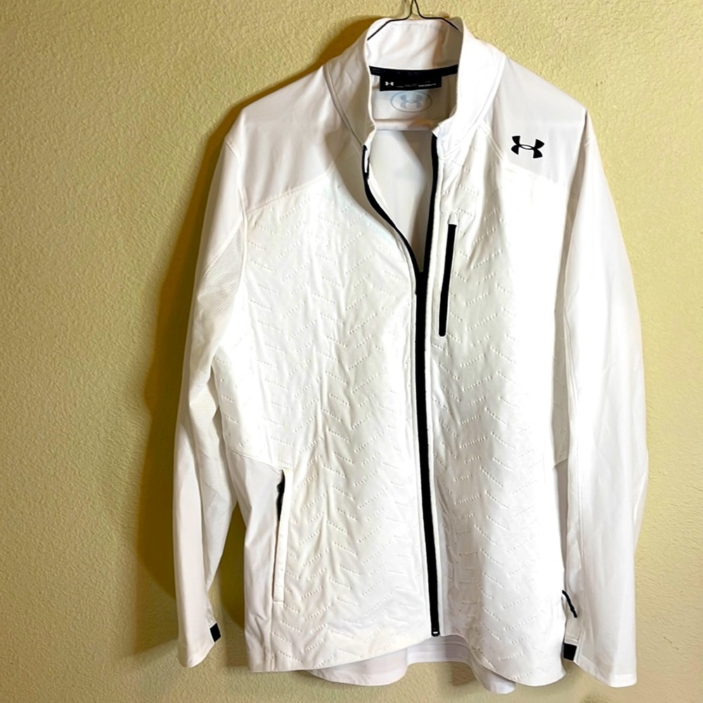 Size L Under Armour Lightweight Jacket with front left chest and side pocket.